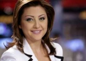 مذيعة الجزيرة السابقة لونا الشبل تسرق الانظار من خلف وليد المعلم في مؤتمر جنيف2