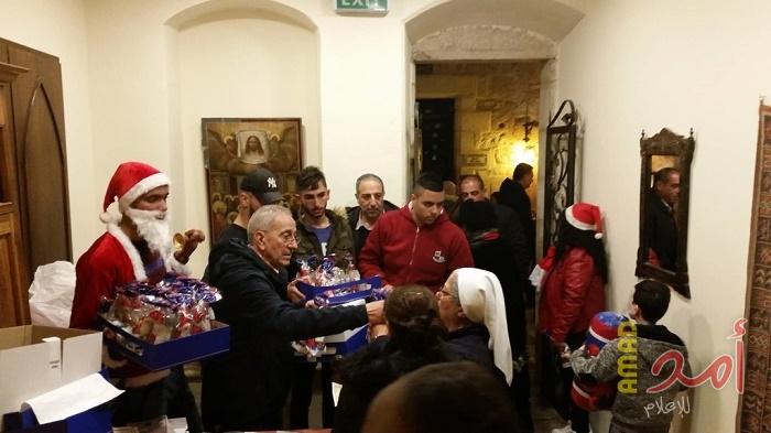 بالصور - جبهة النضال الشعبي في القدس تشارك احتفالا بالسنة الميلادية والأعياد المجيدة