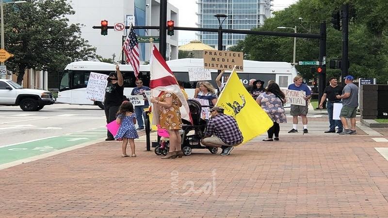 بالرغم من انتشار فيروس كورونا.. تظاهرات في أمريكا للمطالبة بإعادة فتح المدن- فيديو