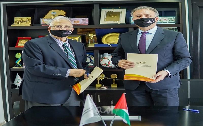 لجنة الانتخابات المركزية والإعلام الرسمي يوقعان مذكرة تفاهم