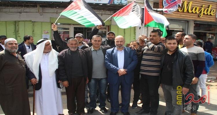 المجلس الفلسطيني للتمكين الوطني يبدأ حملة توزيع العلم الفلسطيني بعنوان "فلسطين تجمعنا"