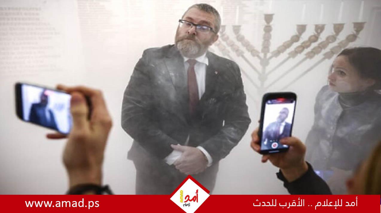 البرلمان البولندي يصوت لصالح رفع الحصانة عن نائب يميني أخمد شموع عيد "الحانوكا" اليهودي