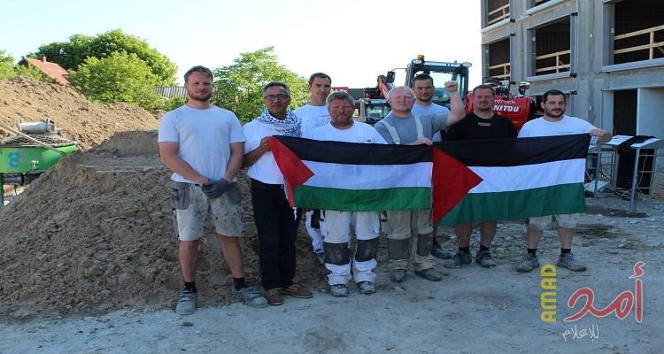 بالصور...عمال البناء الدنماركيين يتضامنون مع فلسطين