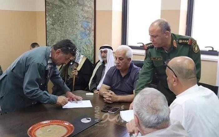 بعد أيام من الشجار.. توقيع اتفاق هدنة ملزمة بين عائلتي "الرجبي والجمل" في الخليل