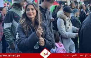 تبرئة بريطانية مؤيدة لفلسطين من العنصرية بعد رفع لافتة "جوز الهند".. تفاصيل